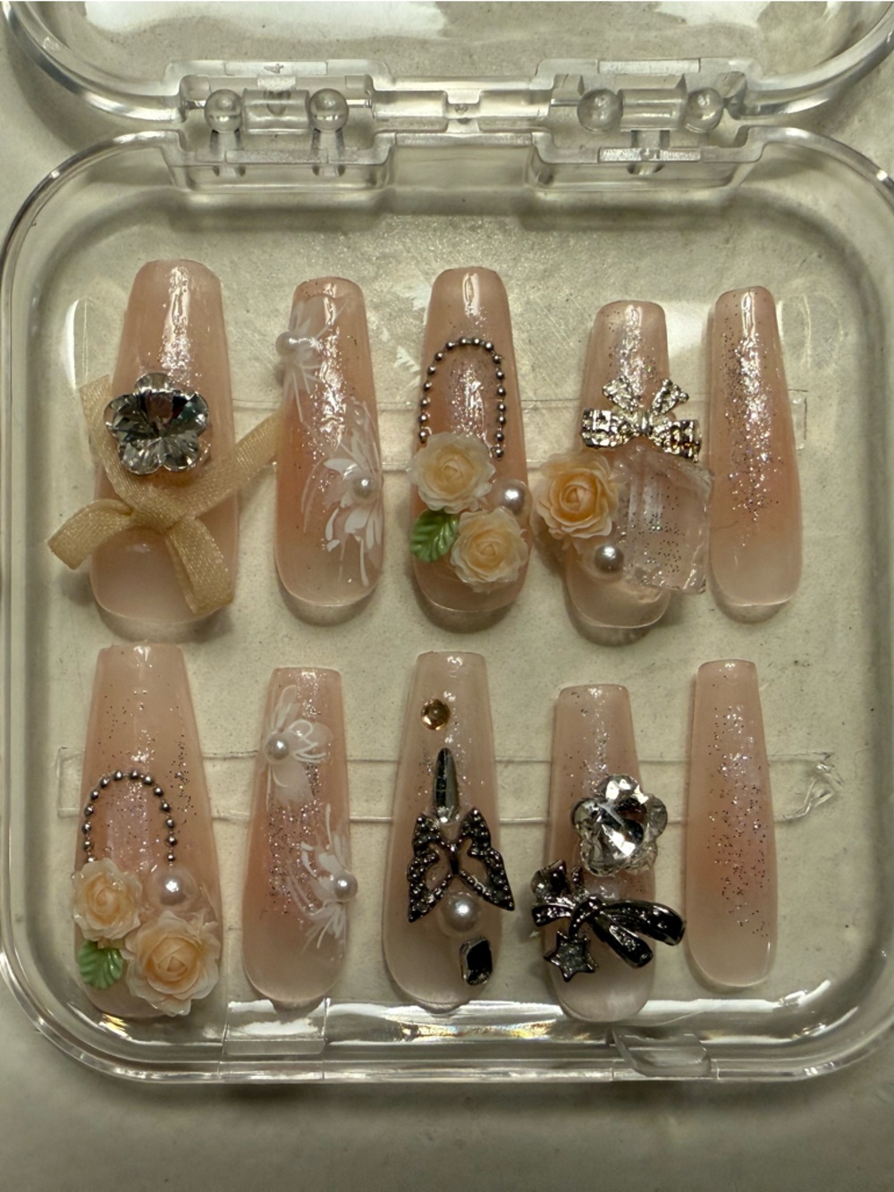 Elegant Nude Nail Art Set with Floral Accents